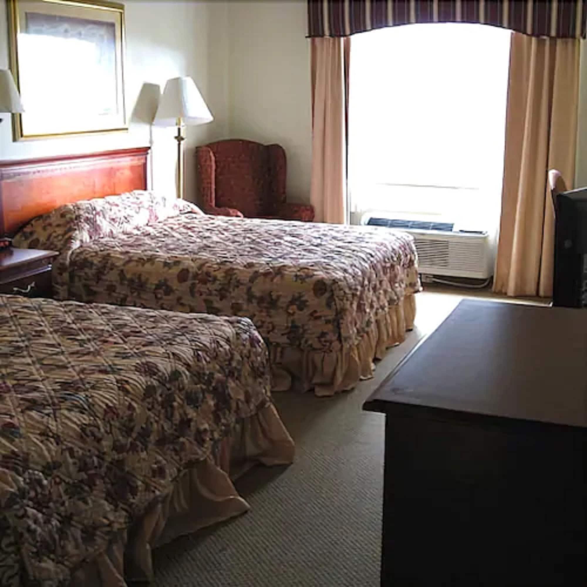 Econo Lodge Inn & Suites Марианна Стая снимка